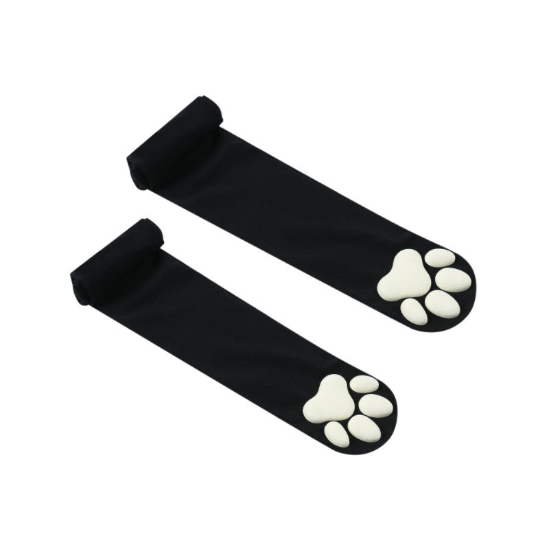 White Paw Pad Cat Black Stockings Close Up