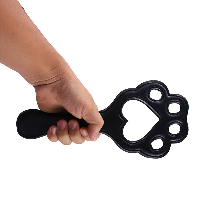 Hand Holding Leather Paw Paddle Profile