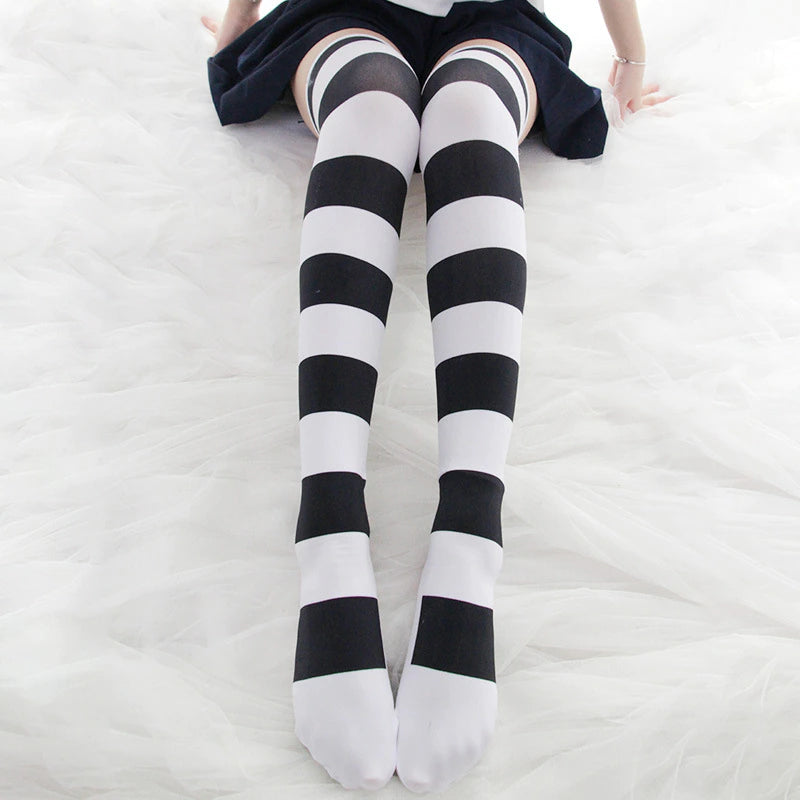 Black Paw Print Striped Stockings Close Up