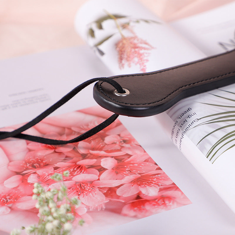 Red & Black Paw Paddle Close Up